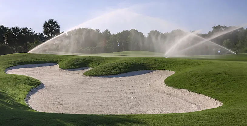 sprinklers on a golf course